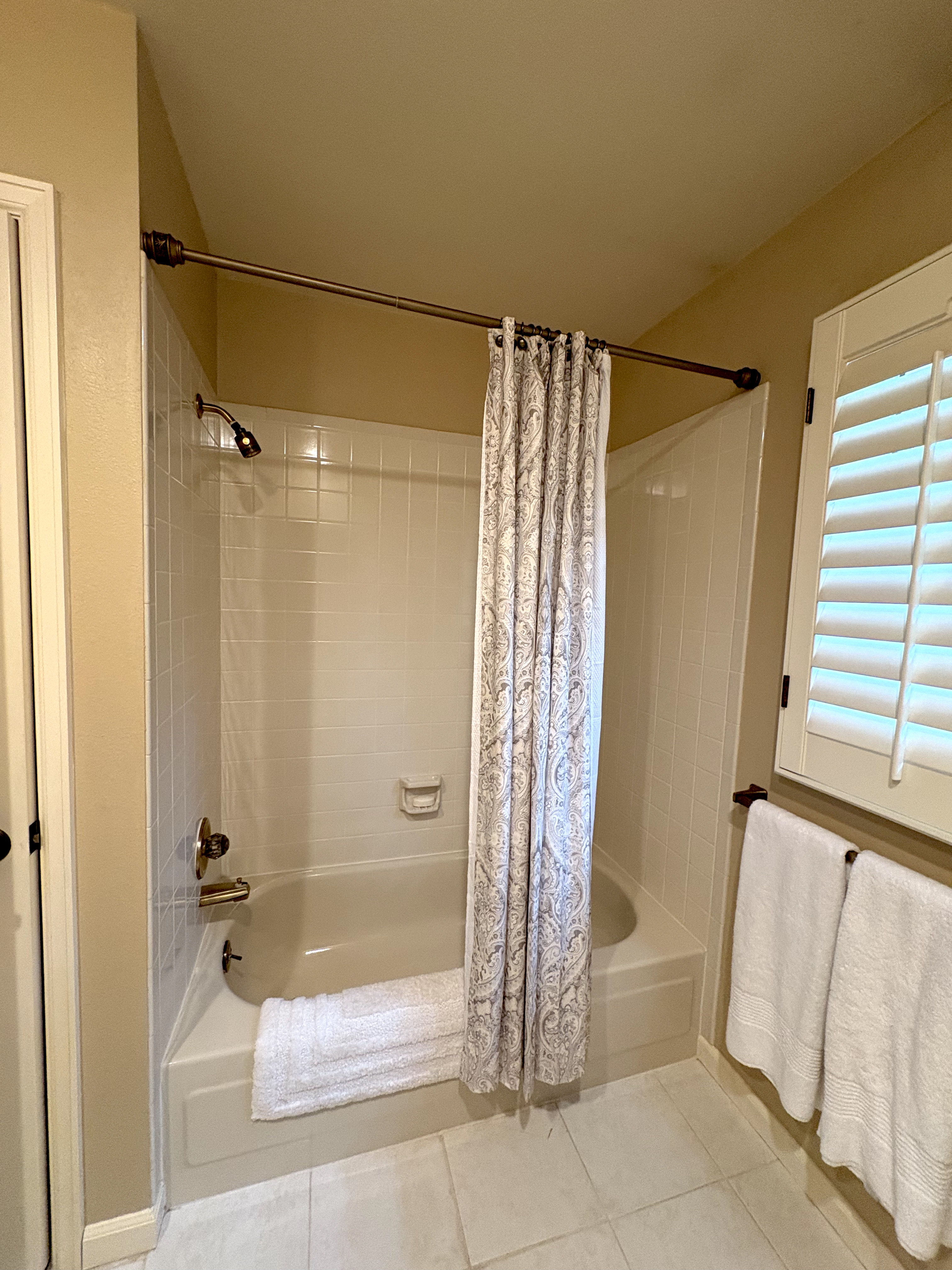 Bathroom before photo – shower and tub
