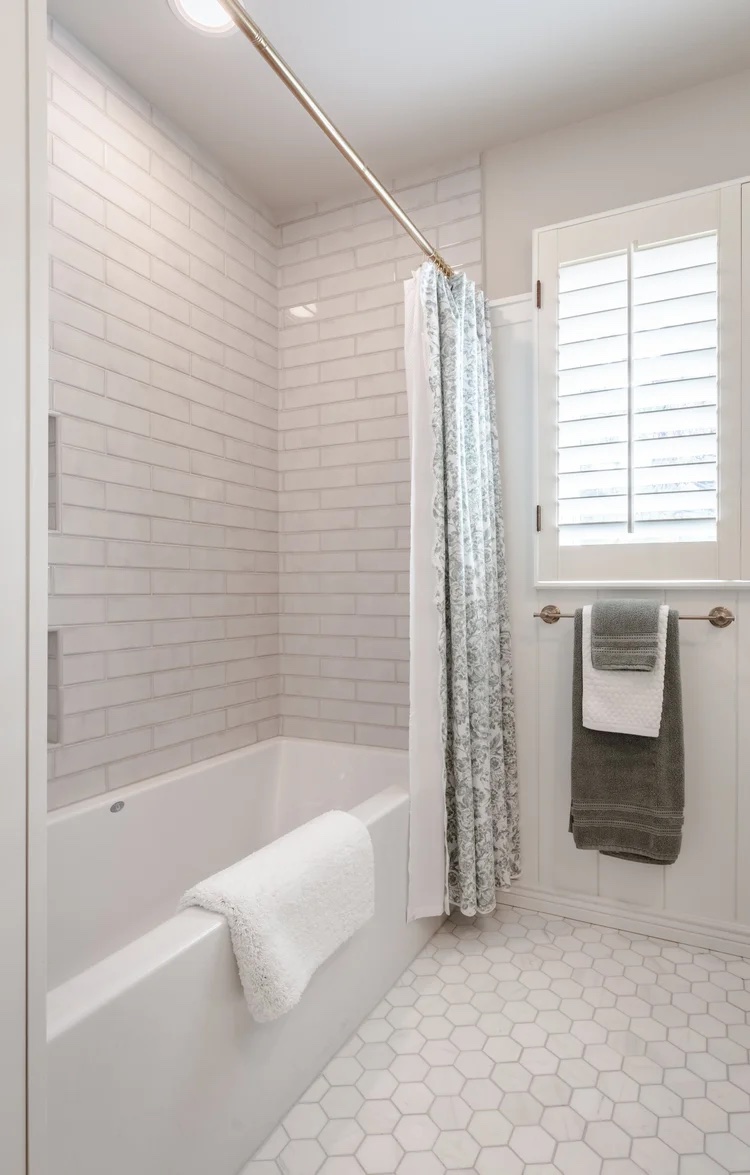 Guest bathroom after photo – tile flooring